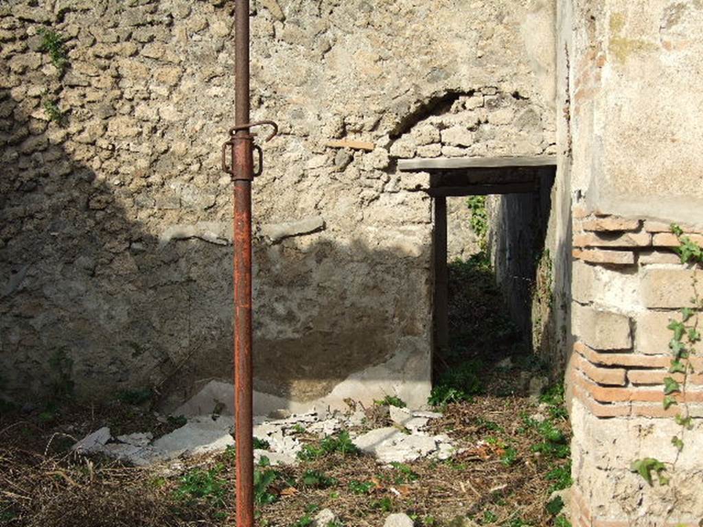 I.2.24 Pompeii. December 2006.   Large room on north side of atrium, with entrance to stairs and dormitory.