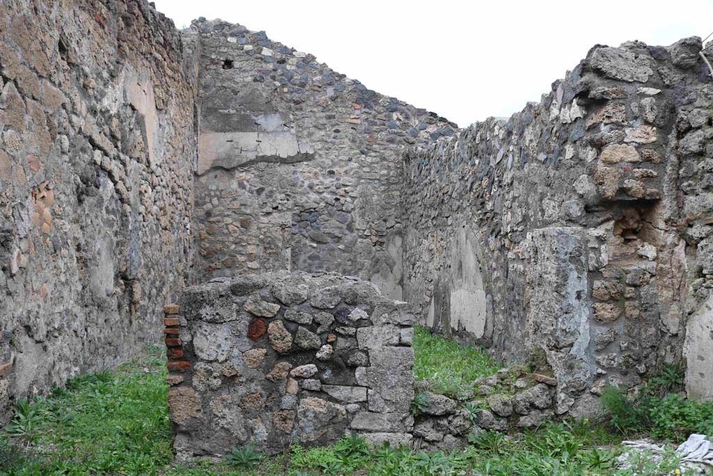 I.4.7 Pompeii. December 2018. East wall of second room, with two doorways to easterly room. Photo courtesy of Aude Durand.


