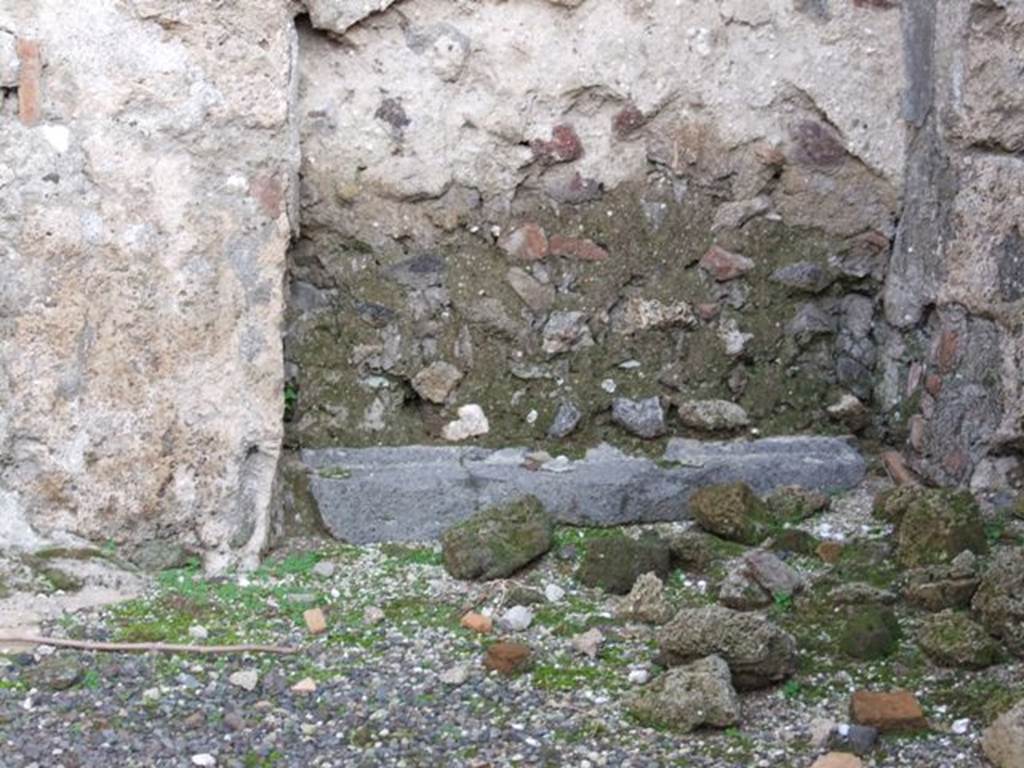 I.4.10 Pompeii. December 2007. South-east corner.  Blocked doorway in east wall with remains of sill at base.