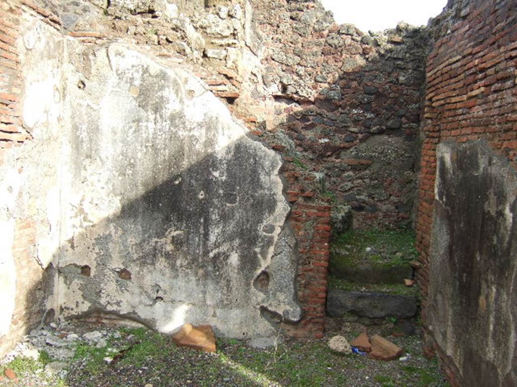 I.4.14 Pompeii. December 2005. East wall with steps to upper floor.