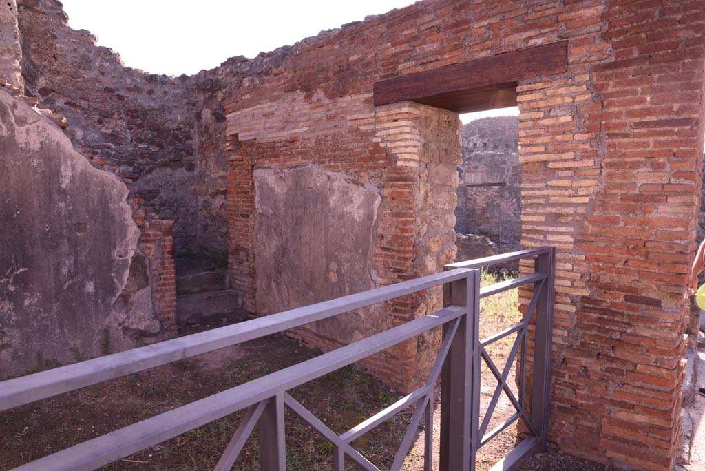 I.4.14 Pompeii. October 2019. Looking towards south wall, with doorway into I.4.13.
Foto Tobias Busen, ERC Grant 681269 DÉCOR.

