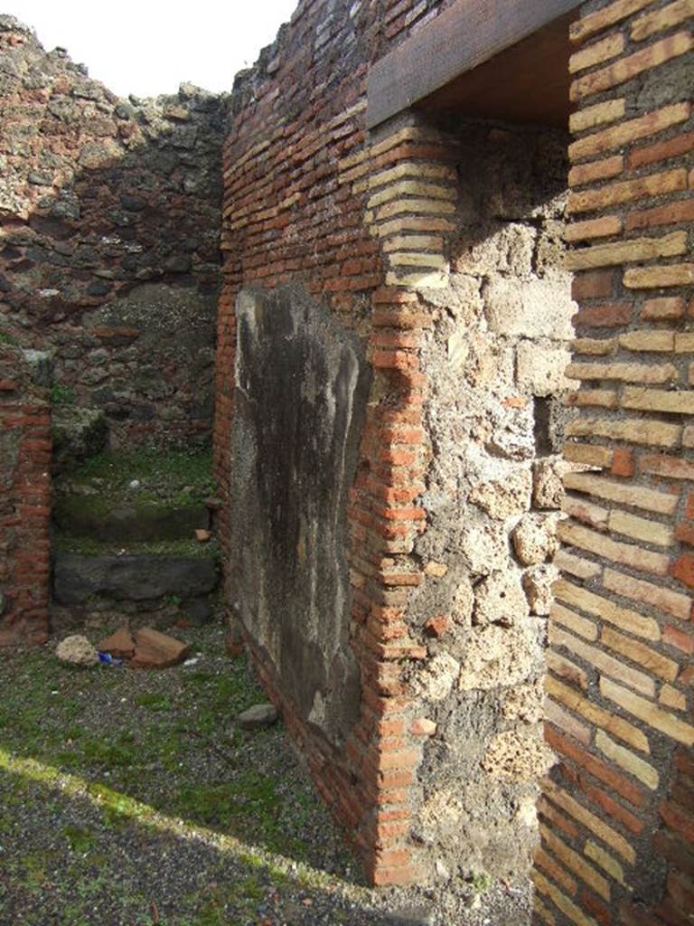 I.4.14 Pompeii. December 2005. South wall, with doorway linking to I.4.13.
