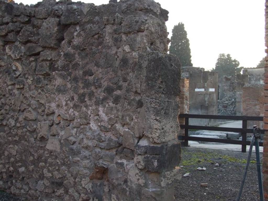 I.4.17 Pompeii. December 2007. West wall with doorway looking west across I.4.16 to I.4.15.