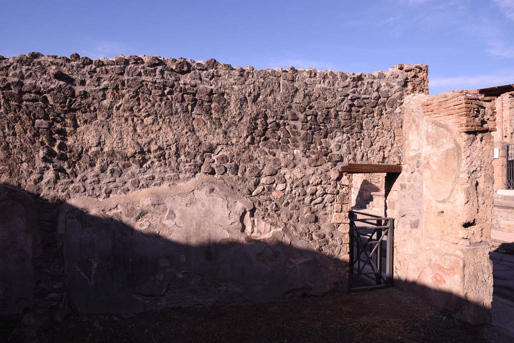 I.4.23 Pompeii. October 2019. Looking towards west wall of shop-room, with doorway into entrance corridor of I.4.22. 
Foto Tobias Busen, ERC Grant 681269 DÉCOR.
