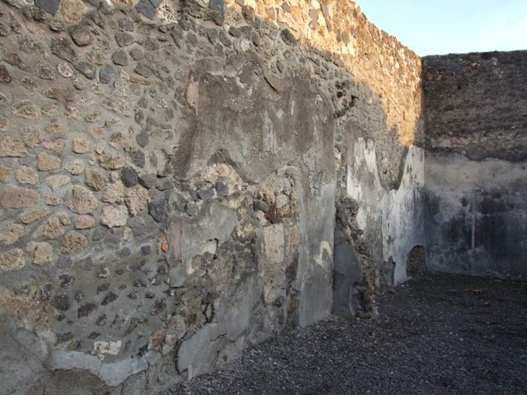 I.4.24 Pompeii. December 2007. East wall of shop and rear room.