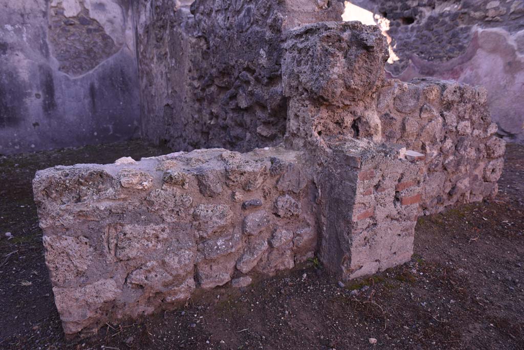 I.4.24 Pompeii. October 2019. 
Looking south to west side of dividing wall between shop and rear room, with I.4.23, on right.
Foto Tobias Busen, ERC Grant 681269 DÉCOR.
