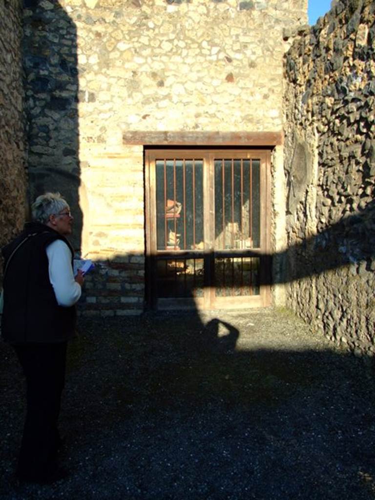 I.4.25 Pompeii. March 2009. Doorway to room 55 in east wall of east ala, 54.