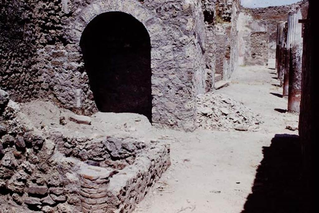 I.4.25 Pompeii. 1966. 
Looking across room 43 towards the middle peristyle 17, with steps to upper peristyle 56. Photo by Stanley A. Jashemski.
Source: The Wilhelmina and Stanley A. Jashemski archive in the University of Maryland Library, Special Collections (See collection page) and made available under the Creative Commons Attribution-Non Commercial License v.4. See Licence and use details.
J66f0568

