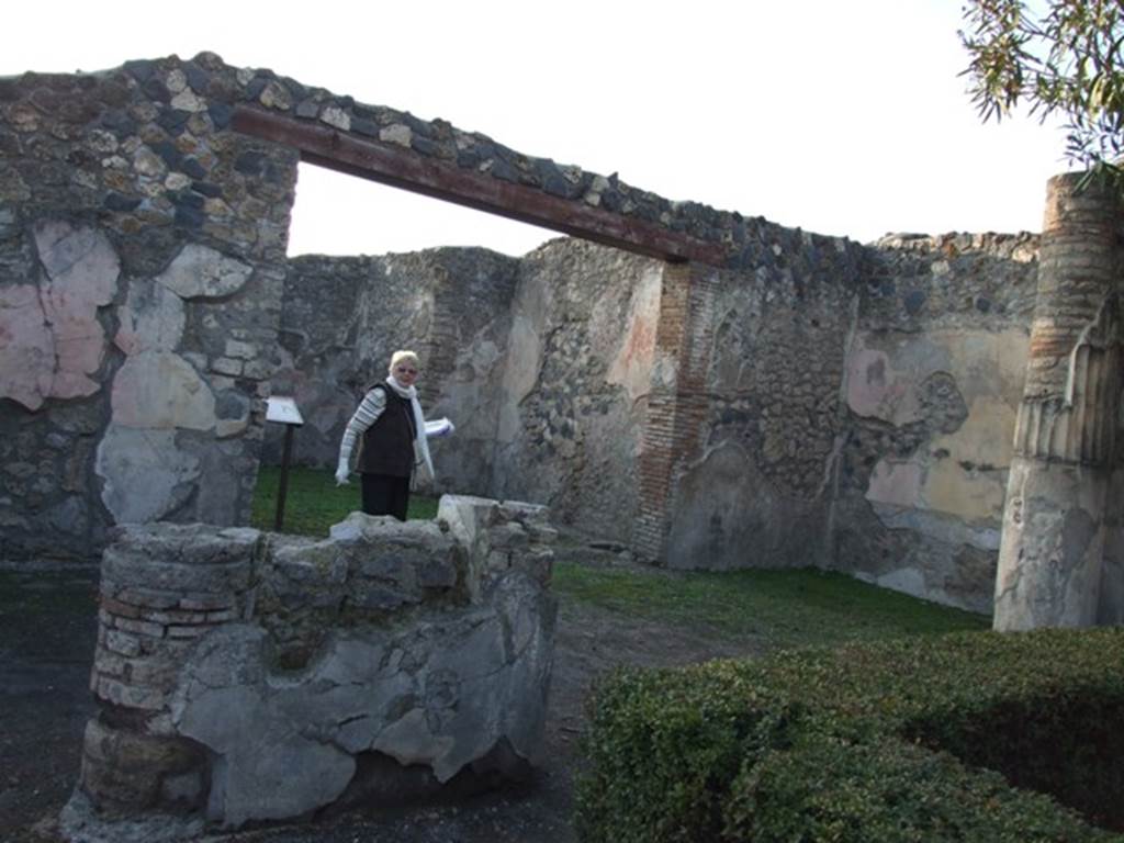 I.4.25 Pompeii. December 2007. Doorway to room 57, centre left, and vestibule in north-west corner of the upper peristyle 56, on right.