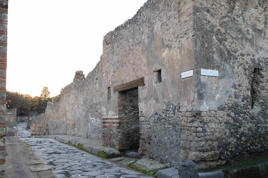 I.4.28 Pompeii. December 2018. 
Looking west on Vicolo del Menandro, with doorway in south-east corner of Ins. 4 of Reg. I. Photo courtesy of Aude Durand.
