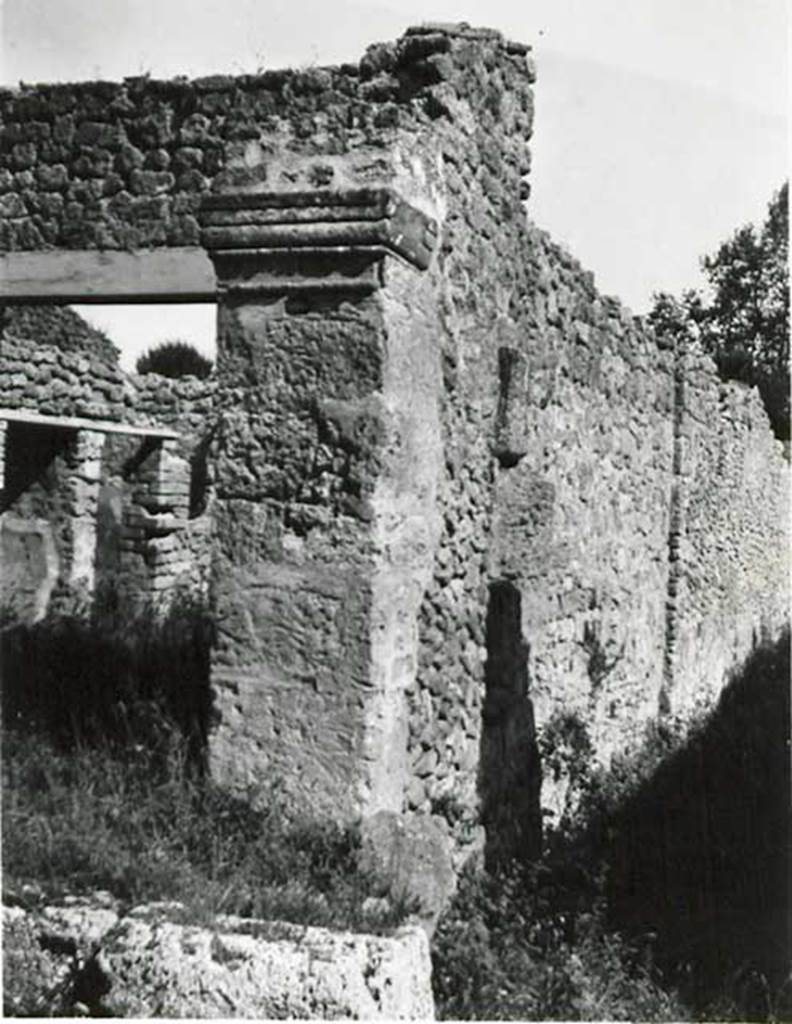 I.5.1 Pompeii. 1936, taken by Tatiana Warscher. Looking towards entrance doorway and west side of monumental structure, and east side of unnamed vicolo between I.5 and I.1. 
See Warscher T., 1936. Codex Topographicus Pompeianus: Regio I.1, I.5. (no.18), Rome: DAIR, whose copyright it remains. 

