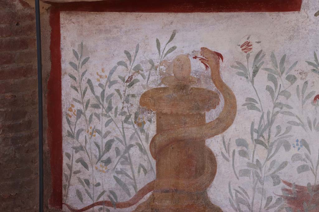I.6.2 Pompeii. September 2019. Painted altar with small serpent, at the south end of the painted lararium beneath Mercury.
Photo courtesy of Klaus Heese.

