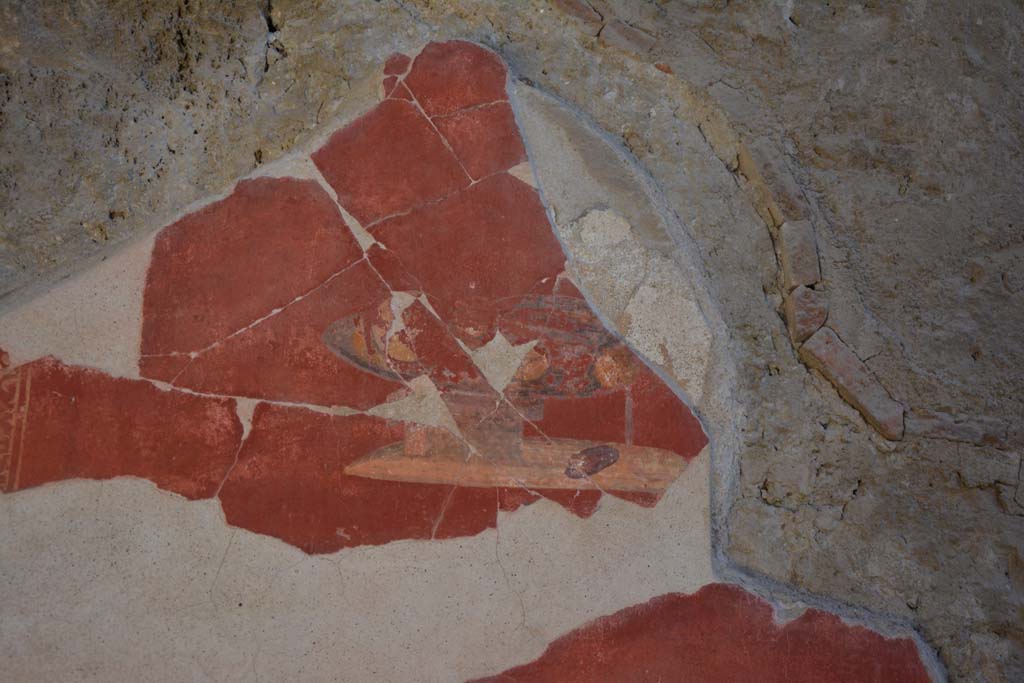 I.7.1 Pompeii. October 2019. Detail of painted vignette of glass vase/dish and fruit, on east wall of atrium.
Foto Annette Haug, ERC Grant 681269 DCOR.
