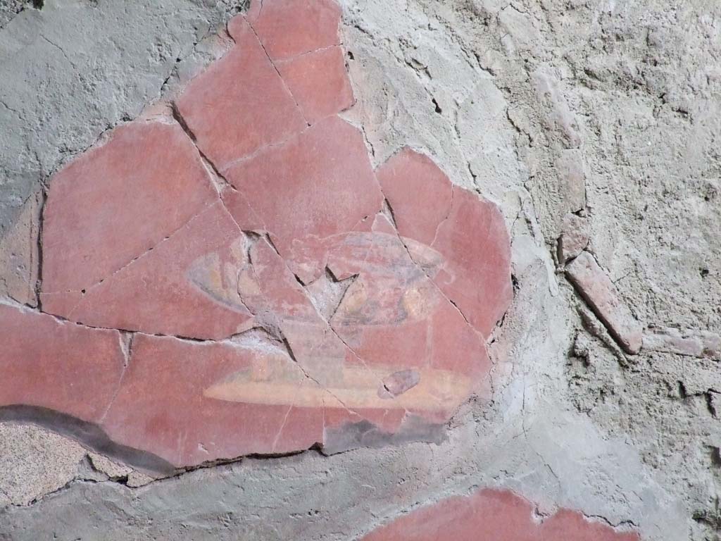 I.7.1 Pompeii. December 2006. Detail of painted vignette of glass vase/dish and fruit, on east wall of atrium.