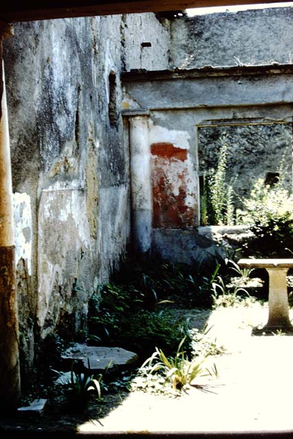 I.7.7 Pompeii, 1968. Shrine in north-west corner of peristyle. 
Photo by Stanley A. Jashemski.
Source: The Wilhelmina and Stanley A. Jashemski archive in the University of Maryland Library, Special Collections (See collection page) and made available under the Creative Commons Attribution-Non Commercial License v.4. See Licence and use details.
J68f0429
