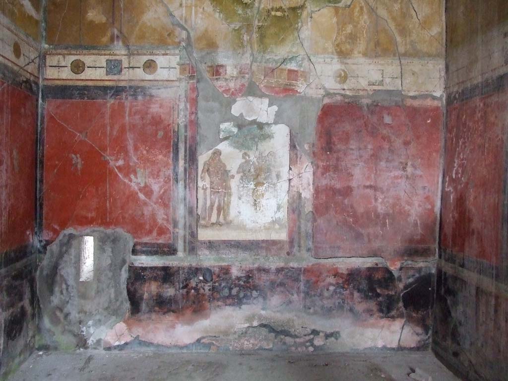 I.7.7 Pompeii. Old undated photograph showing east wall of triclinium.