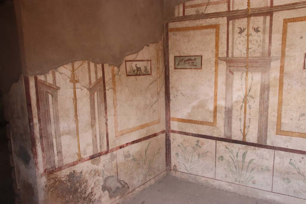 I.7.11 Pompeii. September 2021. 
Looking towards east and south walls of cubiculum on south-east side of atrium. Photo courtesy of Klaus Heese.
