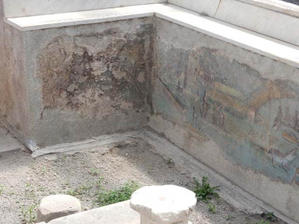 I.7.12 Pompeii. May 2017. Painted panel on inside of south end of the west side of summer triclinium. Photo courtesy of Buzz Ferebee.
