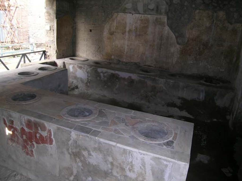 I.8.8 Pompeii. May 2003. Looking north-east across counters. Photo courtesy of Nicolas Monteix.


