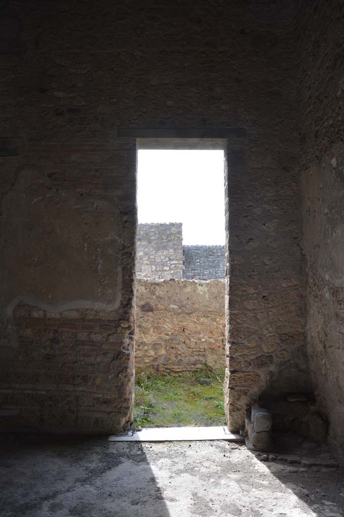 I.8.17 Pompeii. December 2021. 
Room 14, looking towards west wall with window above, and north-west corner with bed recess. 
Photo courtesy of Johannes Eber.
.


