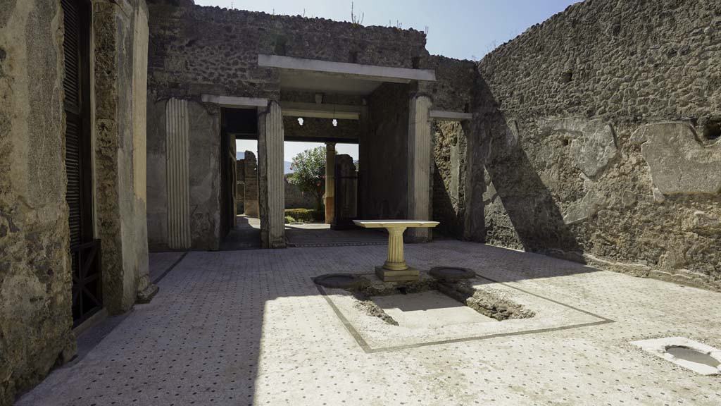 I.9.5 Pompeii. August 2021. Room 3, looking south along east side of atrium towards tablinum. Photo courtesy of Robert Hanson.

