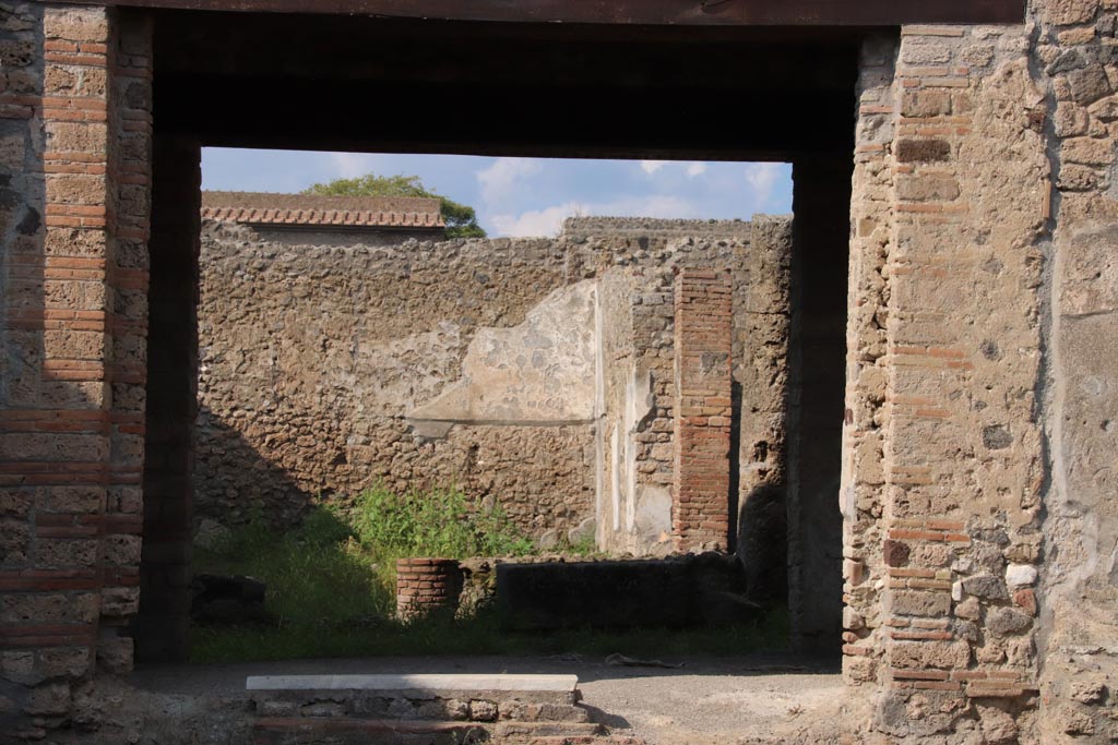 I.9.12 Pompeii. October 2022. Looking north through tablinum towards garden area. Photo courtesy of Klaus Heese.

