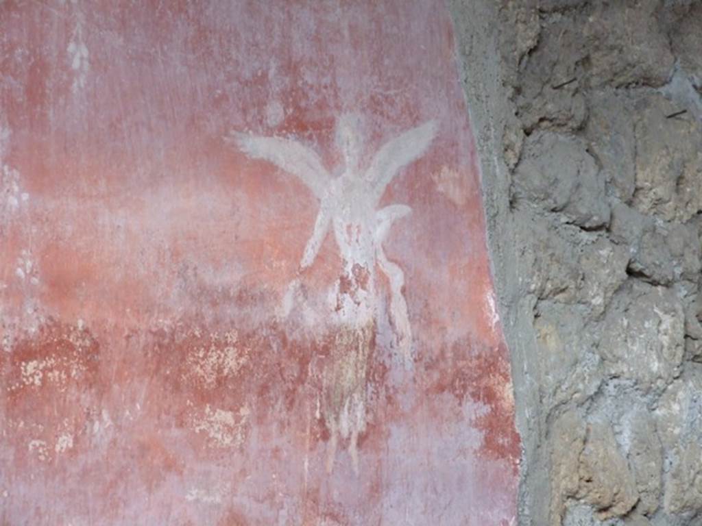 I.9.12 Pompeii. March 2009. Room 6, north wall. Painted female flying figure with plate in left hand.