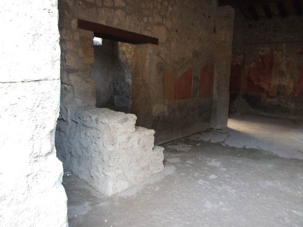 I.10.1 Pompeii. December 2006. East wall of atrium with door to oecus and steps to upper floor.