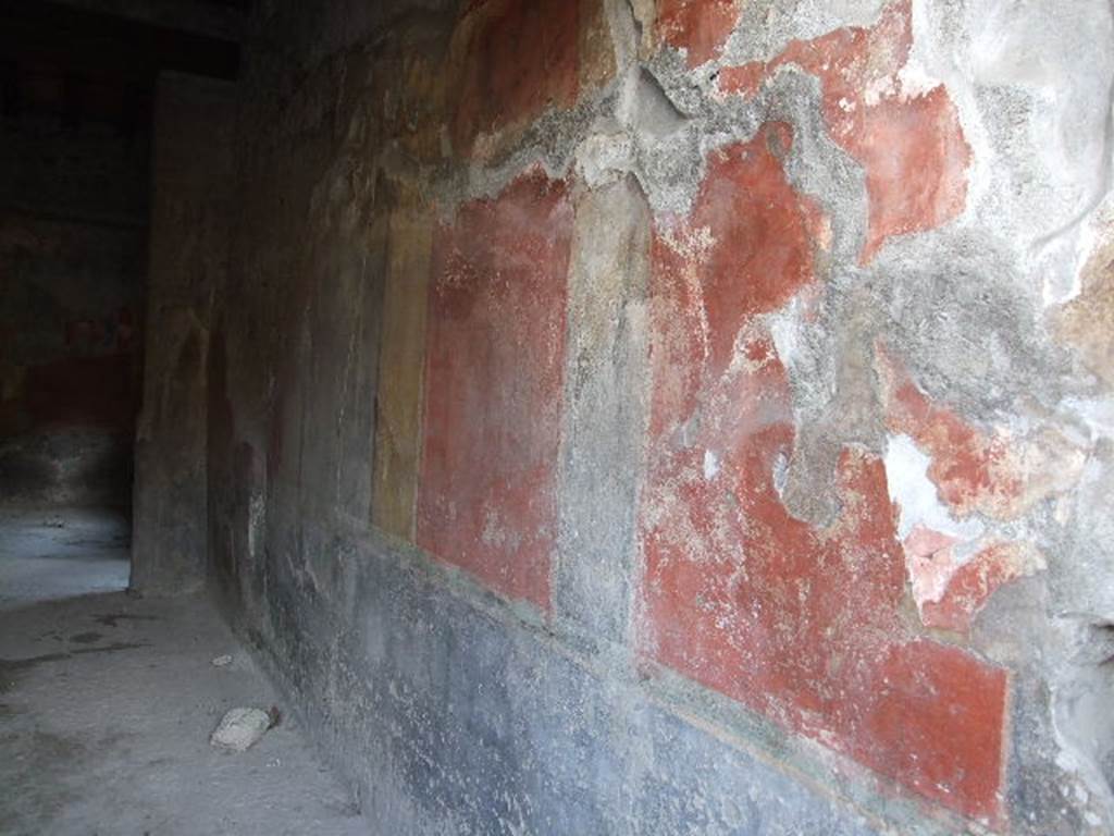 I.10.1 Pompeii. December 2006. West wall of atrium.  On the left of the photo, is the area of the room numbered as 5 in Notizie degli Scavi, the uncovered courtyard, kitchen and latrine, see below.
