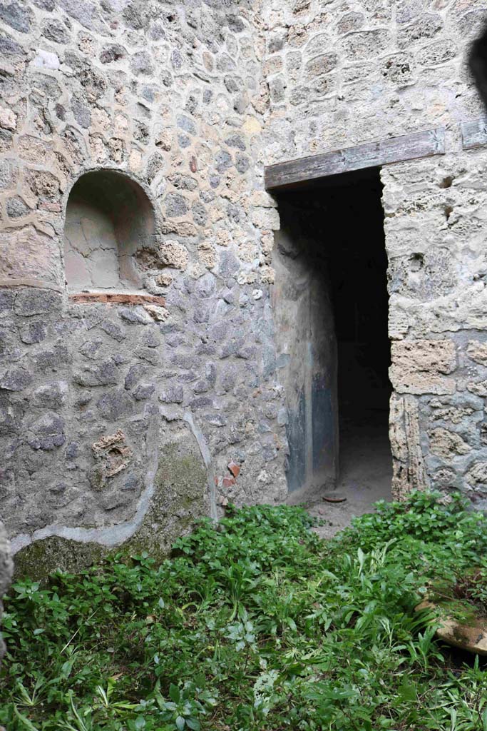 I.10.1 Pompeii. December 2018. 
North-east corner of small uncovered area (5), with doorway to tablinum/atrium. Photo courtesy of Aude Durand.
