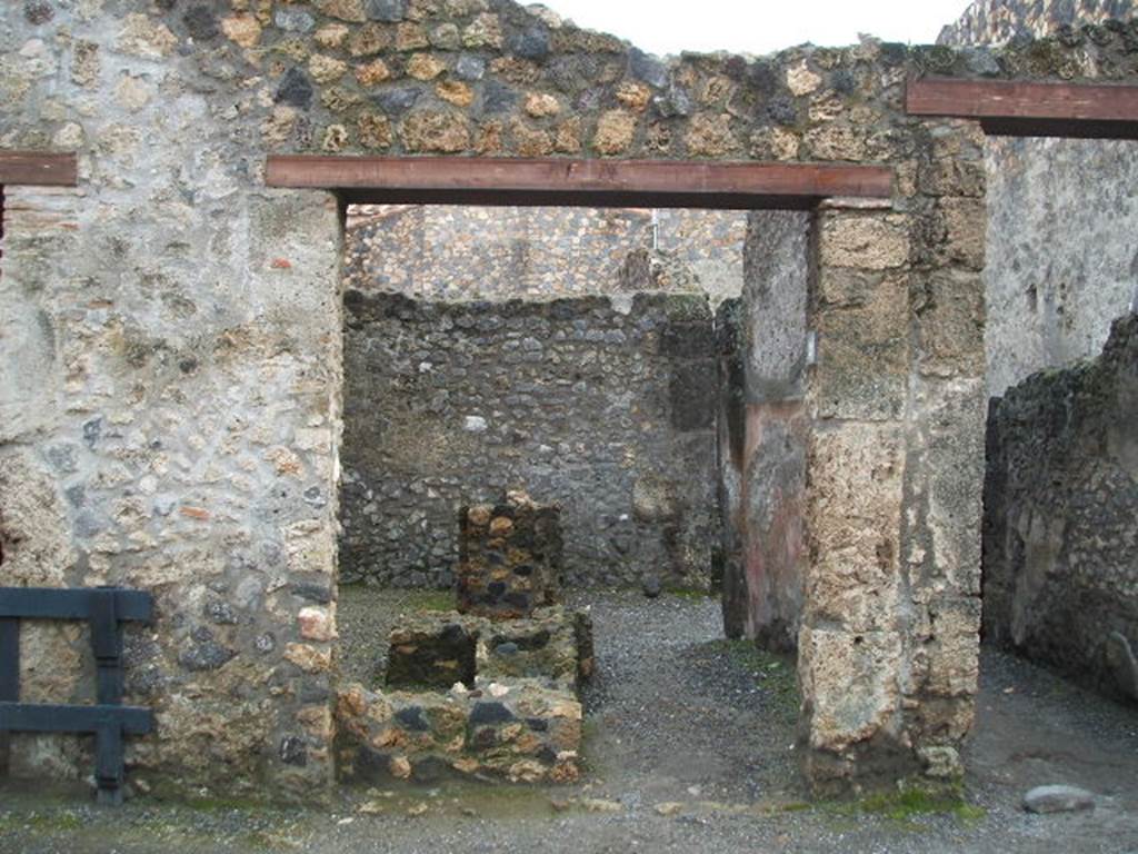 I.10.2 Pompeii, on left. December 2006. Entrance with 1.10.3, on right.