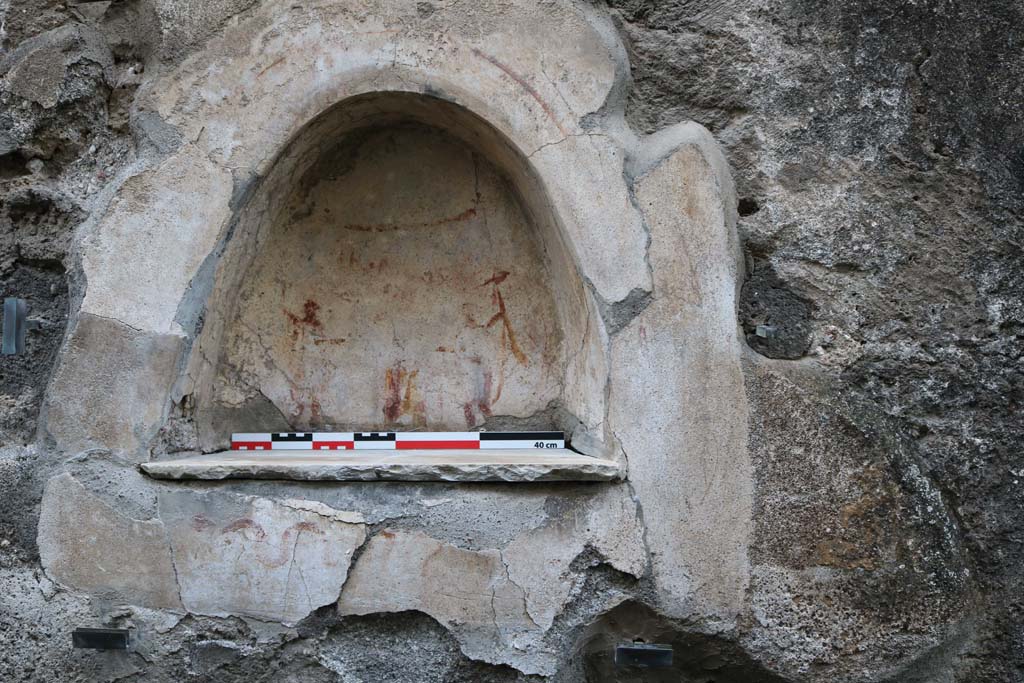 I.10.3 Pompeii. December 2018. Detail of niche on east wall of fauces/entrance corridor. Photo courtesy of Aude Durand.