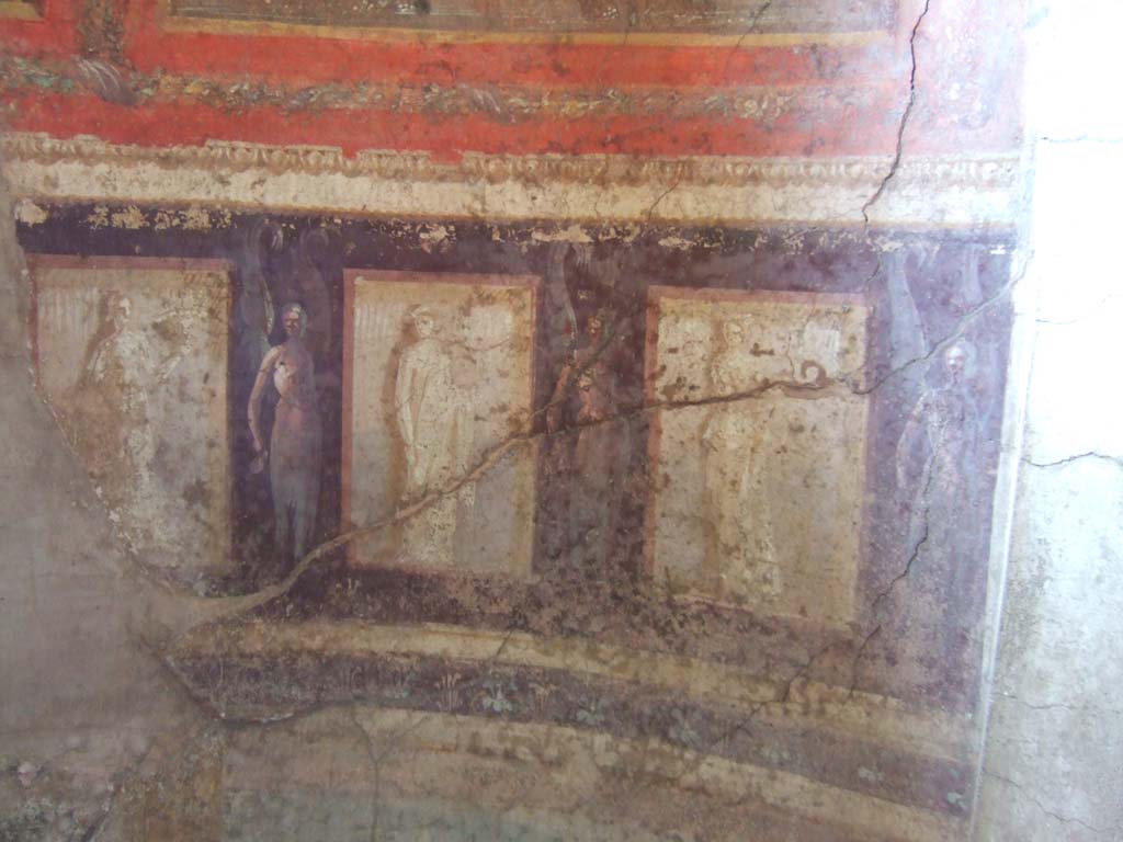 I.10.4 Pompeii. May 2006. Room 48, painted figures in semi-circular alcove.