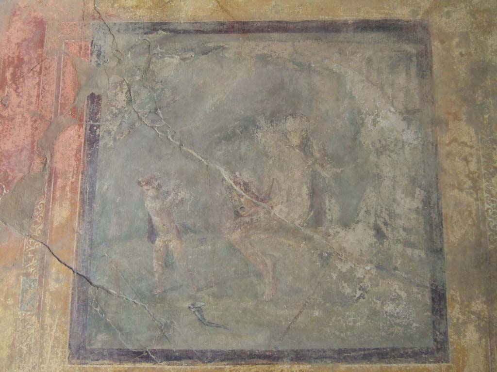 I.10.4 Pompeii. May 2006. Room 19, north wall. Wall painting of cherub scared by a tragic mask held by a nymph.
See Bragantini, de Vos, Badoni, 1981. Pitture e Pavimenti di Pompei, Parte 1. Rome: ICCD. (p. 126)
