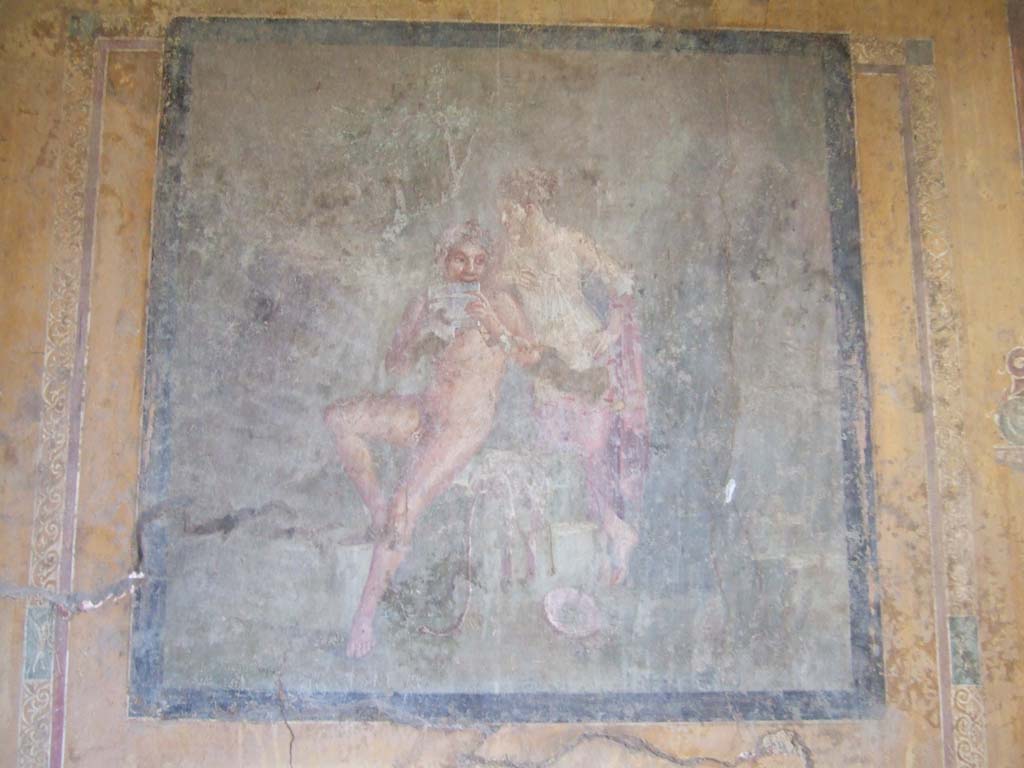 I.10.4 Pompeii. May 2006. Room 19, south wall. Wall painting of a Satyr playing a flute to a Maenad. 
See Bragantini, de Vos, Badoni, 1981. Pitture e Pavimenti di Pompei, Parte 1. Rome: ICCD. (p. 127)
See Ling, Roger: La Casa del Menandro, in Menander, La Casa del Menandro di Pompei. Edited by G. Stefani. Milan: Electa, 2003 (p.39). 
