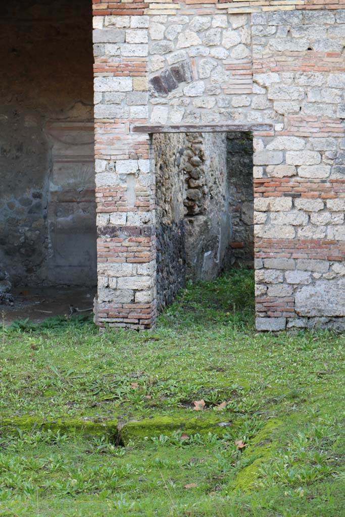 I.10.8 Pompeii. December 2018. Doorway to corridor 7. Photo courtesy of Aude Durand.