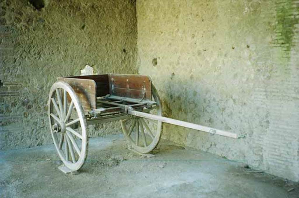 I.10.14 Pompeii. June 2010. Reproduction two-wheeled cart, with bronze fittings and iron fittings.  Photo courtesy of Rick Bauer.
