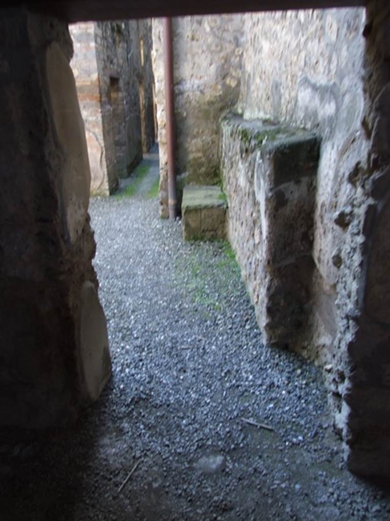 I.10.15 Pompeii. March 2009. 
Corridor outside room on north side of entrance. Looking south from atrium of I.10.16.

