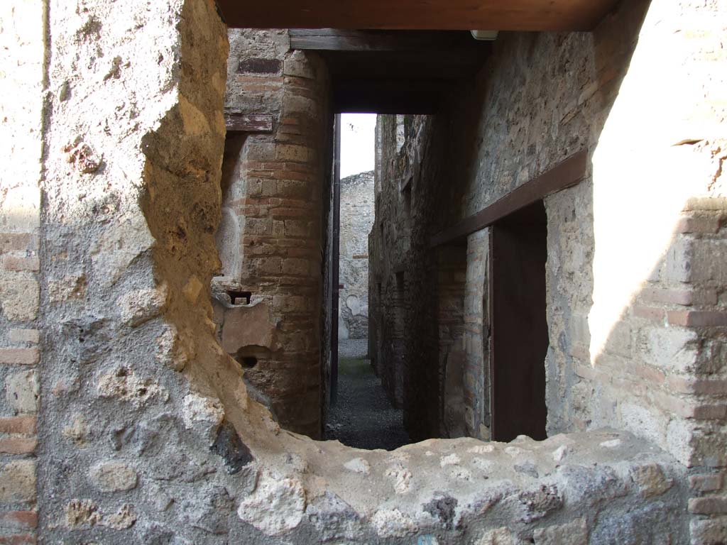 I.10.15 Pompeii. December 2006. Corridor leading to I.10.15 from near stable, looking north past rooms.