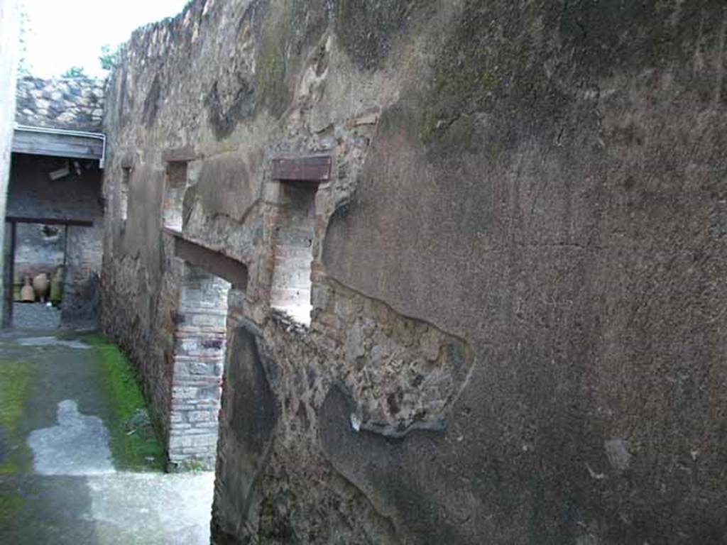 I.10.15 Pompeii. May 2010. South wall of corridor leading to service quarters. Looking east.