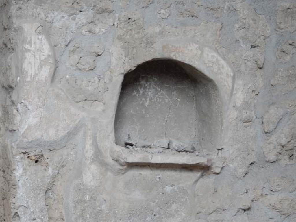 I.10.16 Pompeii. May 2017. Detail of niche in west wall of atrium. Photo courtesy of Buzz Ferebee.

