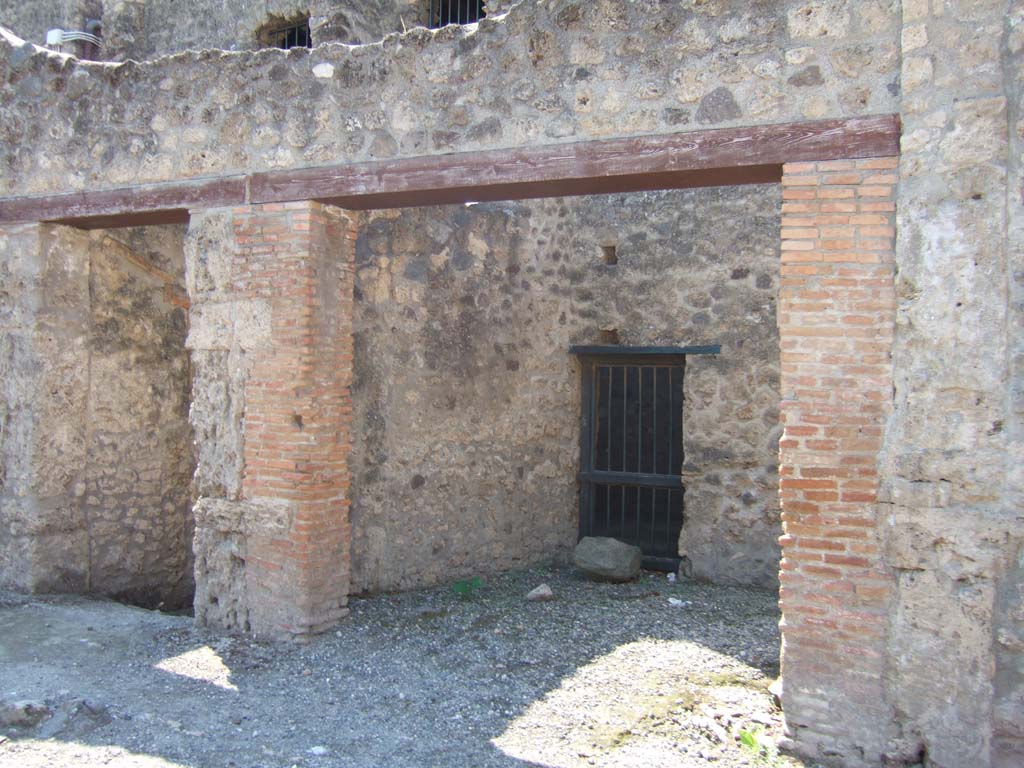 I.10.17 Pompeii. September 2005. Entrance doorway of shop, looking south-west.