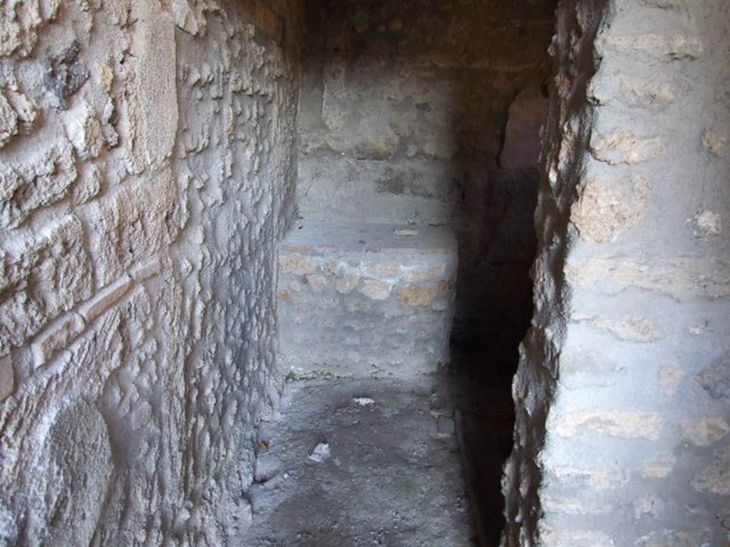 I.11.14 Pompeii. December 2006. Looking north into kitchen with bench or hearth, from end of corridor.