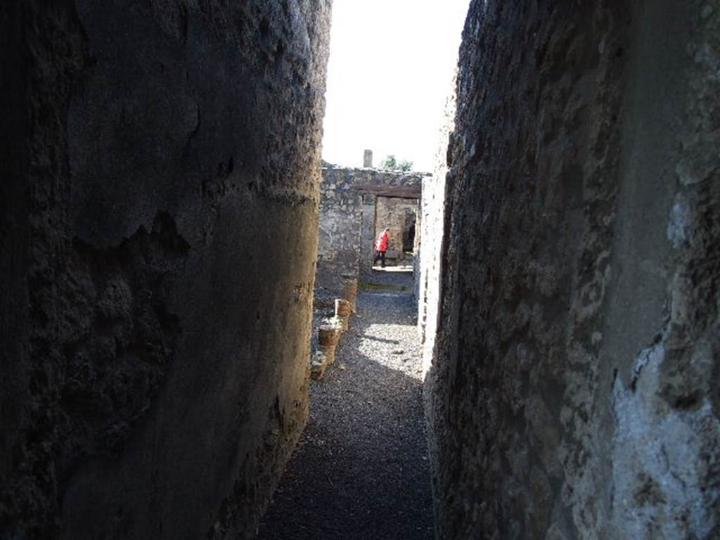 I.11.14 Pompeii. December 2006. Looking west along corridor to peristyle area and front of house. 