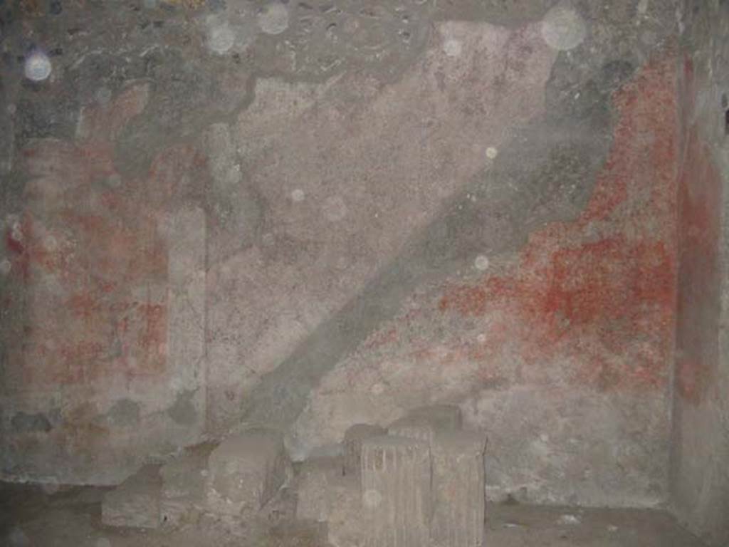 I.12.3 Pompeii. May 2003. Room 1, courtyard. Remains of steps and site of staircase on east wall.
Photo courtesy of Nicolas Monteix.
