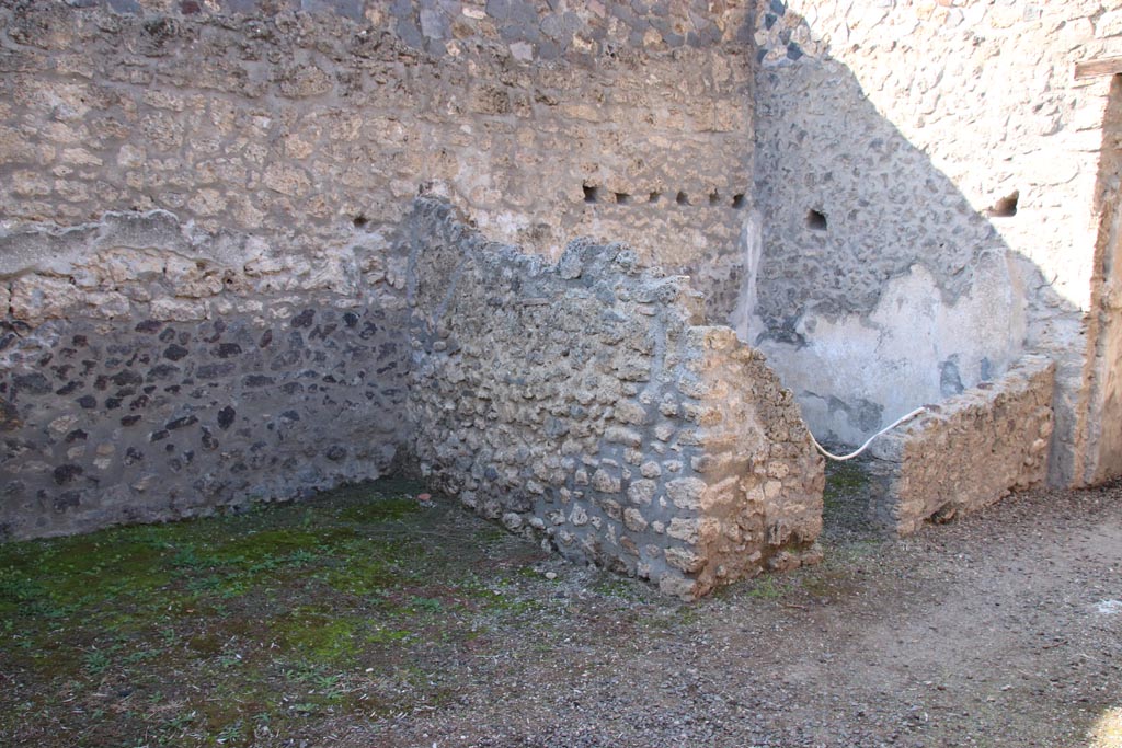 I.12.8 Pompeii. October 2022. Looking north-west in room 5, with doorway to room 6, on right. Photo courtesy of Klaus Heese.