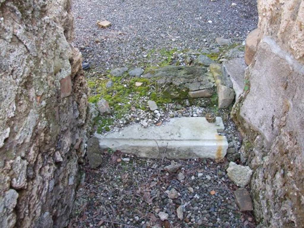 I.12.15 Pompeii. March 2009. Steps to outside triclinium, at east end of corridor.