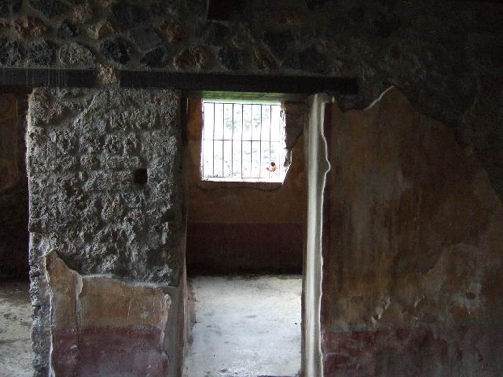 I.13.9 Pompeii. December 2005. Doorway to triclinium, with window to garden.