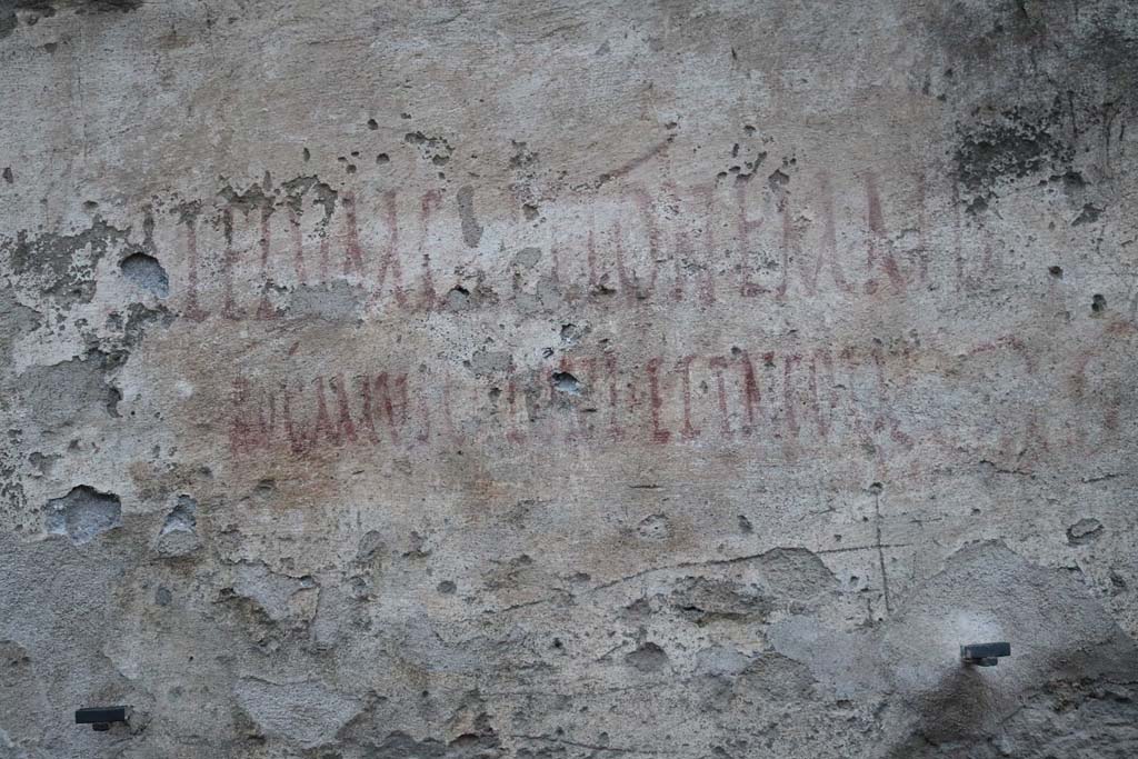 I.14.7/8 Pompeii. December 2018. Detail of graffiti, east side (left). Photo courtesy of Aude Durand.