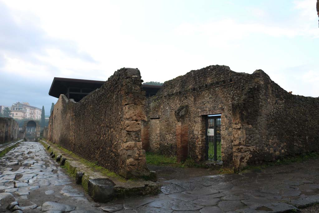 I.20.5 Pompeii.  December 2018. 
Looking south-west towards entrance on corner of Via della Palestra, on right, at junction with Via di Nocera, on left. Photo courtesy of Aude Durand.
